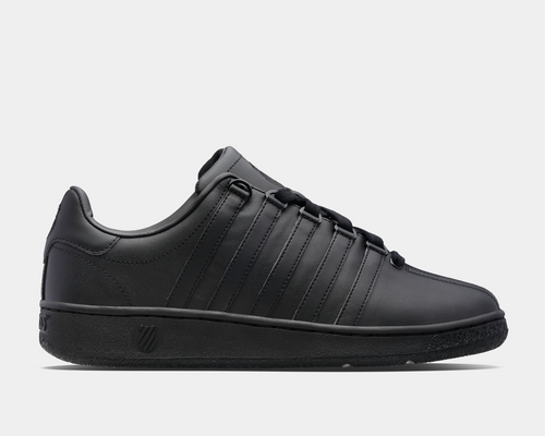 A black K-Swiss Classic VN sneaker with five stripes on the side, displayed on a plain background.