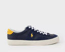 A navy blue and yellow sneaker with leather, suede, and nubuck overlays, featuring white laces and an embroidered Ralph Lauren signature Pony at the side.