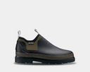 Bogs Tillamook Bay waterproof slip-on boots in black and olive green with durable rubber outsole, side view.