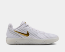 Nike LeBron Witness X basketball shoes in white with gold Swoosh and textured mesh upper, side view.