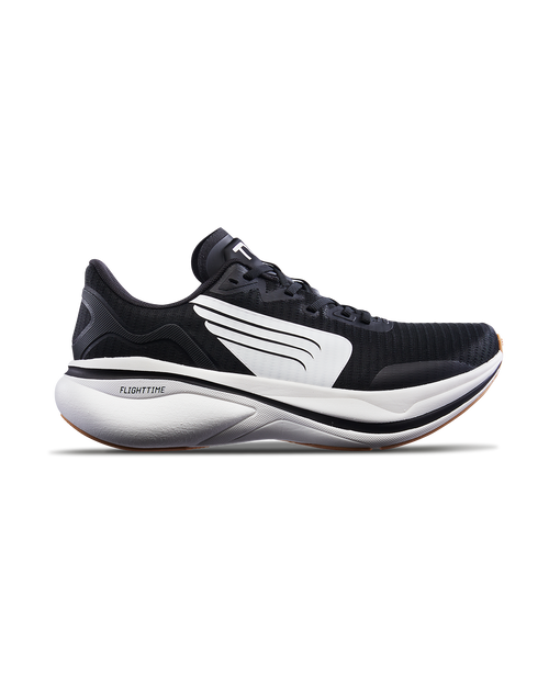 black running shoe with white sole