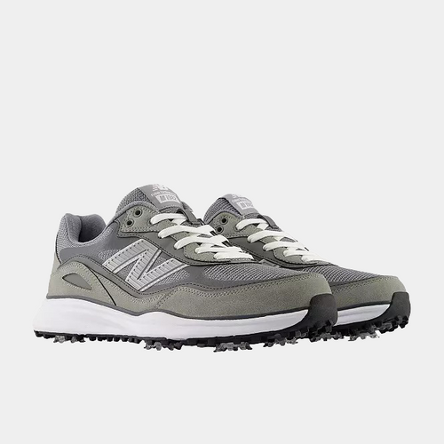 New Balance Golf 1982 Golf shoes in gray with white laces, mesh upper, and spiked outsole, front angle view.