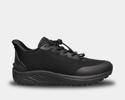 Propét One Velocity Step-In Sneaker in all black with breathable mesh upper, cushioned midsole, and slip-on design, side view.