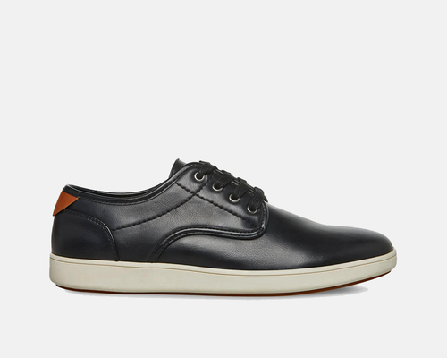 Steve Madden Fenta Leather shoes in black leather with lace-up closure, contrast tan heel detail, and white rubber sole, side view.