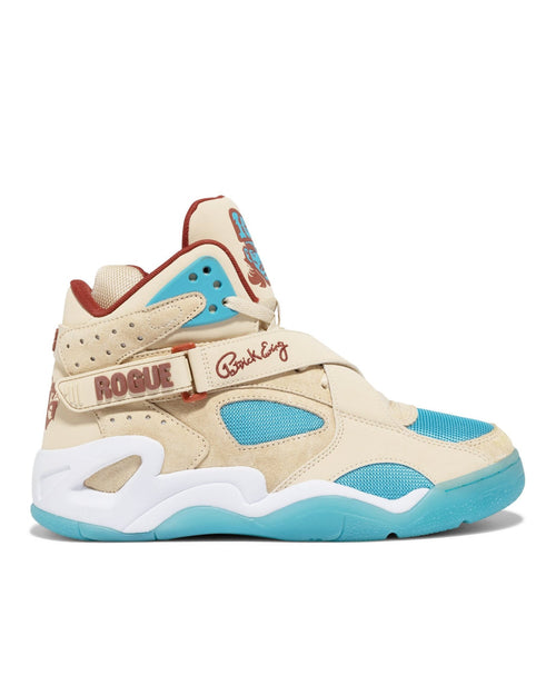 Ewing Athletics ROGUE x ICE T sneakers in beige with turquoise mesh panels, red accents, and signature strap detail, side view.