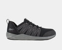 Reebok Work Astroride Work shoes in black with gray accents, mesh upper, reinforced toe, and durable outsole, side view.