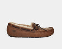 UGG Olsen moccasin slippers in chestnut suede with leather laces and plush sheepskin lining, side view.