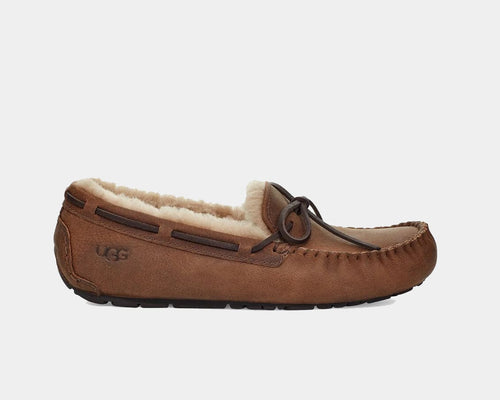 UGG Olsen moccasin slippers in chestnut suede with leather laces and plush sheepskin lining, side view.