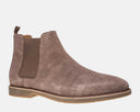 Steve Madden Highline Chelsea Boot in taupe suede with elastic side panel and pull tab, side view.